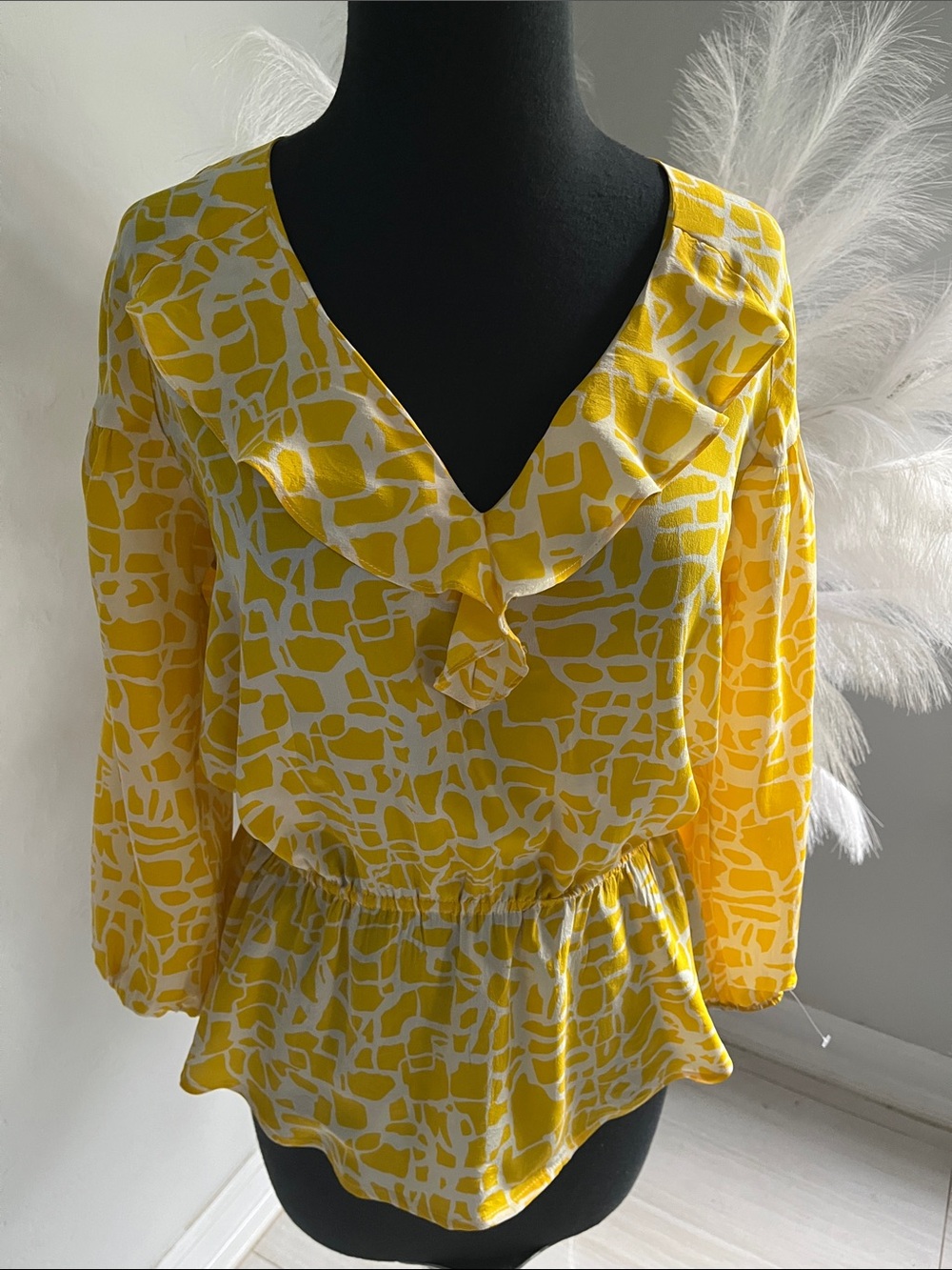 Yellow Printed Ruffle Peplum Blouse by